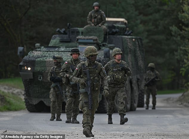 Polish soldiers seen for an intensive training session with M1A2 Abrams tanks at the Nowa Deba training ground, on May 6, 2023