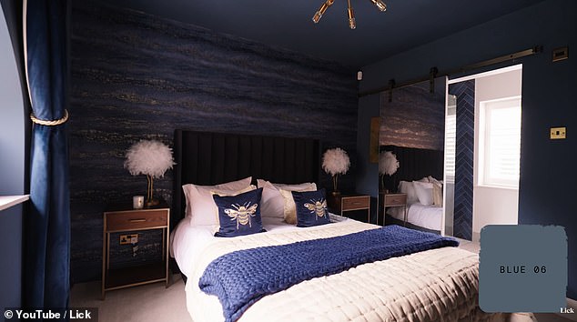 Pictured is the 'folly room', a guest room finished in a dark blue color which she said was the oldest room in the house, built in the 16th century