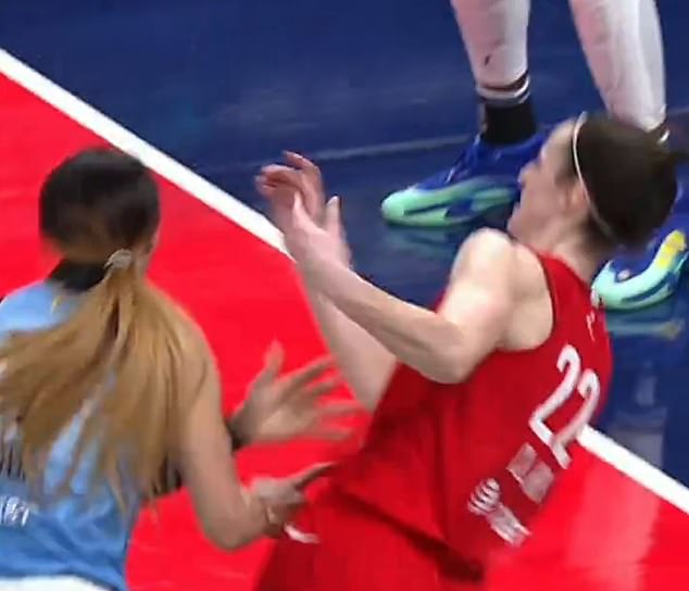 Clark was inexplicably checked to the ground by Chicago Sky's Chennedy Carter