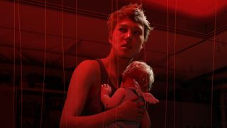 Death Stranding 2 art featuring Fragile and a baby dosed in a red shade