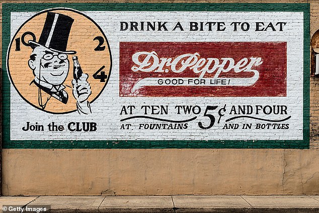 Old billboard from Dr.  Pepper on a downtown building in Pittsburg, Texas