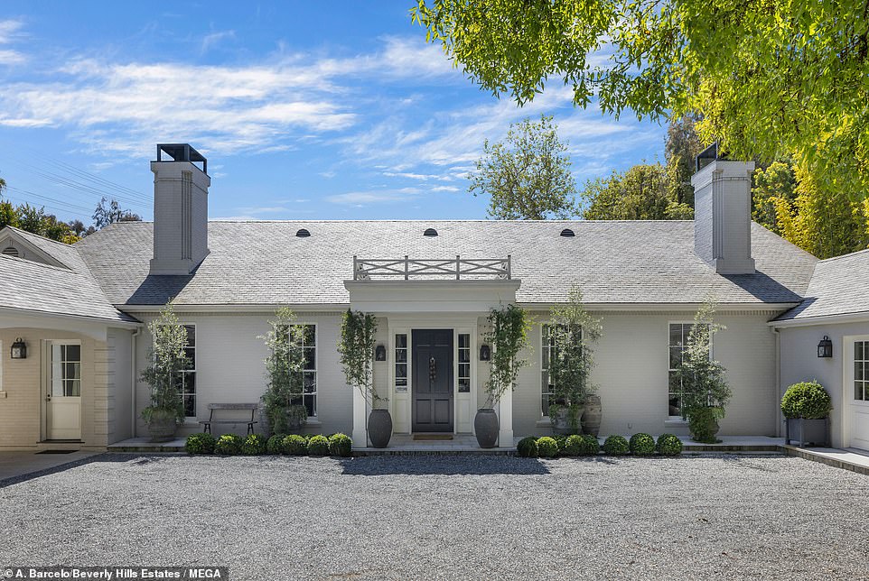 The Oscar winner is selling her home — which features a guesthouse complete with movie theater and wine cellar — in L.A.'s Brentwood neighborhood for $29.99 million, according to the Wall Street Journal