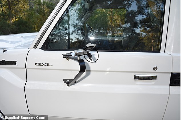 Lynn told police the shot fired by Russell Hill in a deadly struggle blew the side mirror of his Landcruiser (pictured) and struck Carol Clay in the head