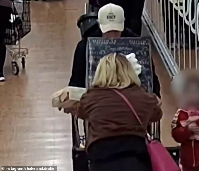 The pair were seen on CCTV switching their trolleys after the woman placed the large gift (pictured) on top of another trolley containing several packs of meat.