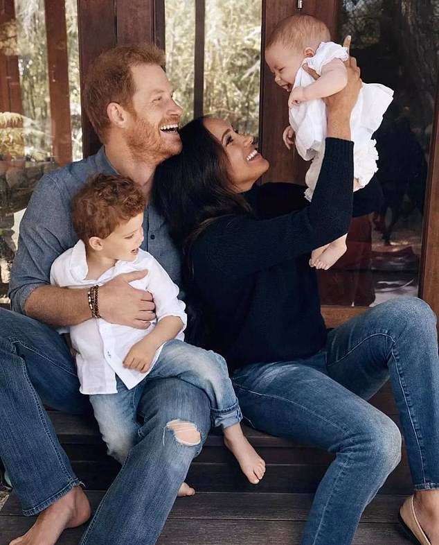 Prince Harry and Meghan with their two children in a Christmas card they released in December 2021