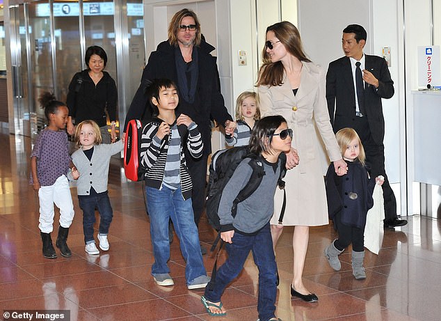 Pitt has been embroiled in an ongoing divorce battle for years, apparently stemming from a 2016 incident on a plane in which Jolie accused Pitt of assaulting her;  the family seen in 2011