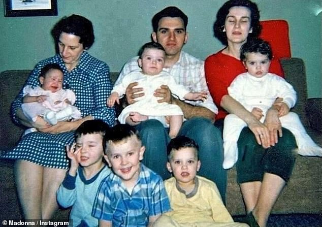 She also shared a rare family photo with her family as a child