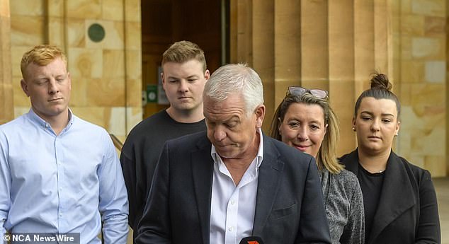 SA Police Commissioner Grant Stevens appeared outside court with his family