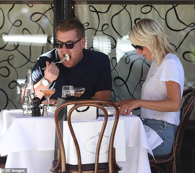 Corden says he believes the media has simply exaggerated the story (Corden and Julia Carey seen having lunch at Scott's restaurant in Mayfair on June 27, 2018 in London, England)