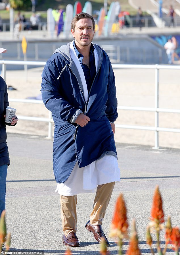 He wore a pair of brown loafers and made sure to dress and stay warm if he could