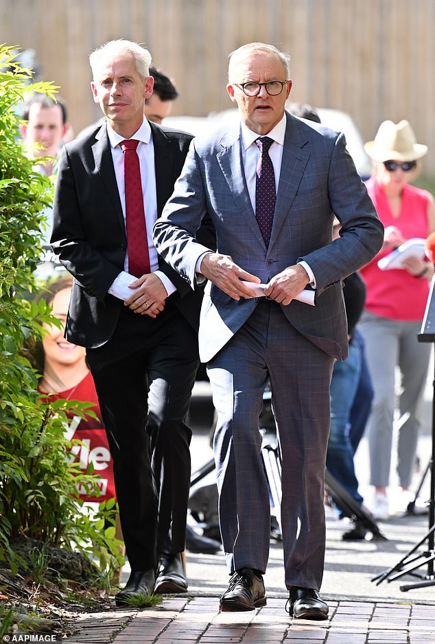 Immigration Minister Andrew Giles has been under pressure to resign since the release late last year of more than 150 detainees, including murderers and sex offenders. Mr Giles (left) is pictured with Prime Minister Anthony Albanese