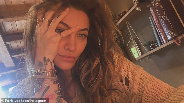 A typical millennial, Billy Morrison's video vixen, reportedly has her entire body covered in more than 80 tattoos (pictured Monday)