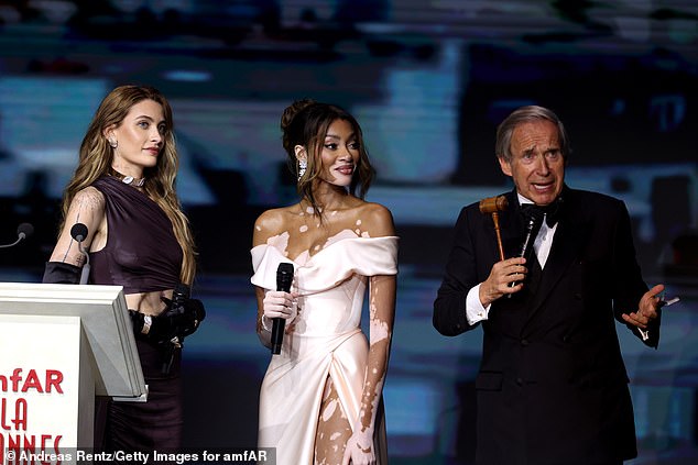 Jackson went glamorous in Jean Paul Gaultier couture on May 23 to raise $16 million at the auction at the Hotel du Cap-Eden-Roc