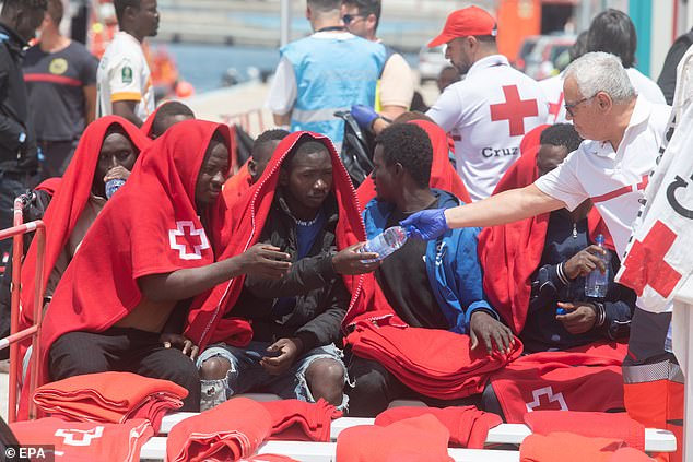 In the photo: Sub-Saharan migrants receive medical attention in the Canary Islands after trying to reach Fuerteventura by boat