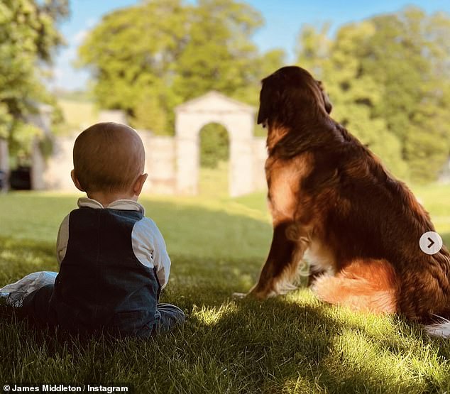 Tiny Inigo looked particularly cute in his navy dungarees over a white long-sleeved top as he petted the puppies