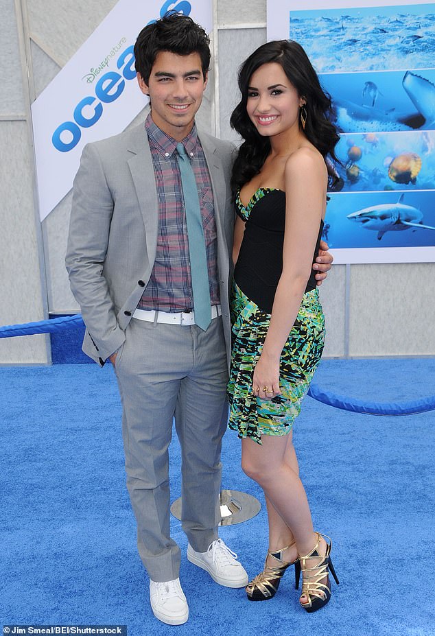 More than a decade ago, Joe dated another Demi: Demi Lovato.  They were together from 2009 to 2010. Seen in 2010