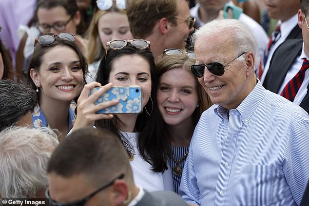 Biden stopped for selfies during the event