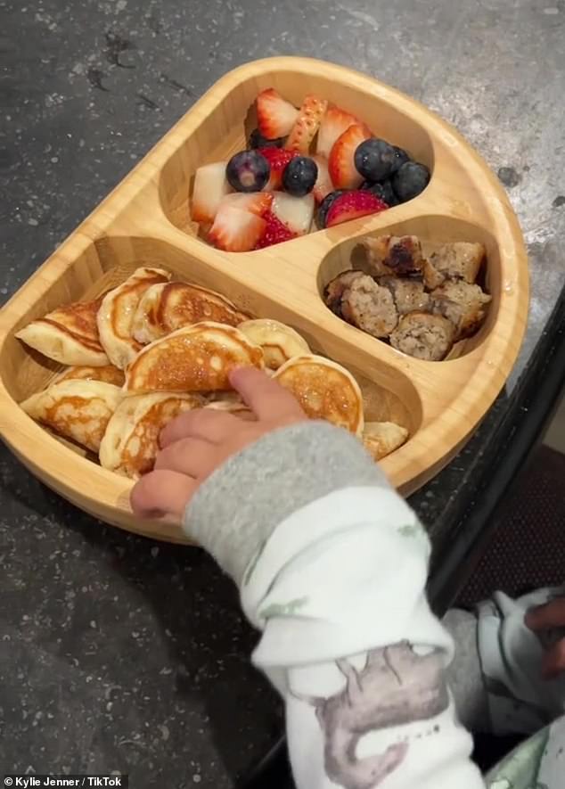 Kylie showed off preparing a plate of breakfast for her son Aire in March