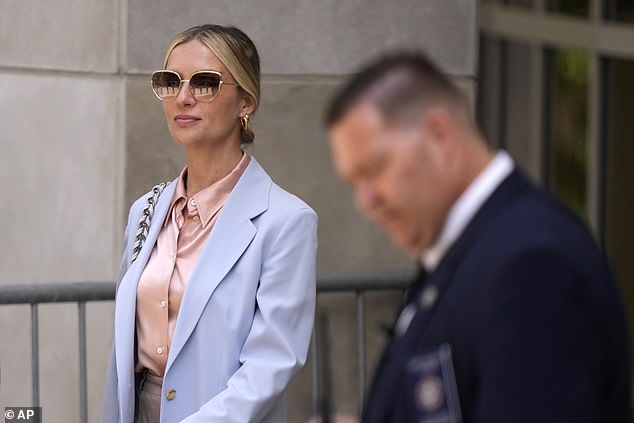 Cohen walks out of the courtroom the second day after her outburst