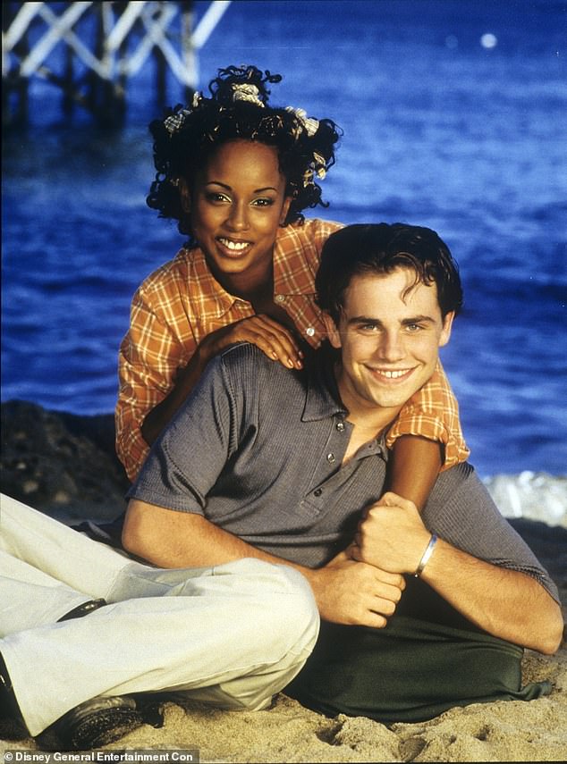 McGee is best known for her role as Angela Moore on Boy Meets World, which she joined in 1997 and played its seventh and final season in 2000;  seen with Rider Strong in 1998