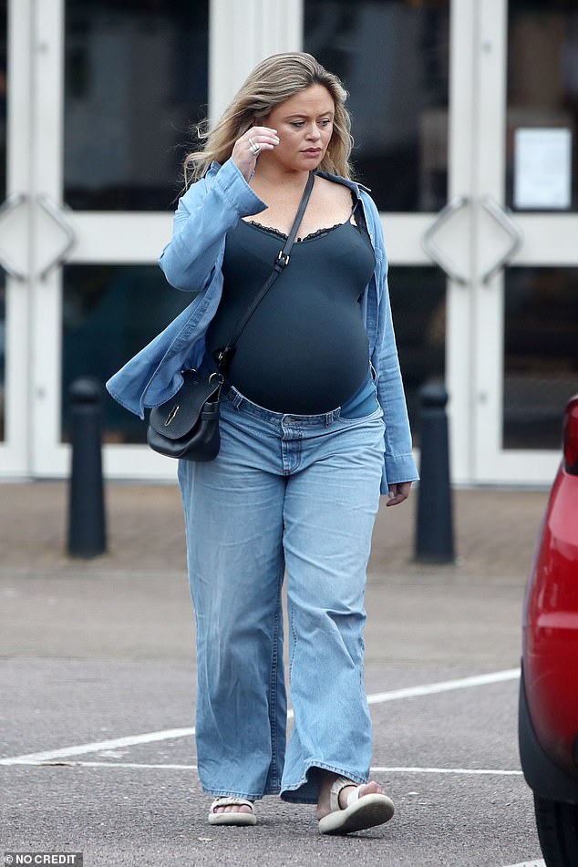 Emily looked stunning in her stylish clothes as she showed off her blossoming baby bump