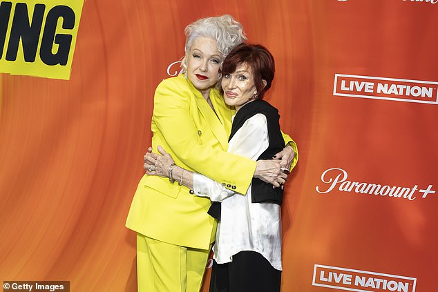 The music manager, who hosts The Osbournes Podcast with her family, beamed as she hugged her friend at the event