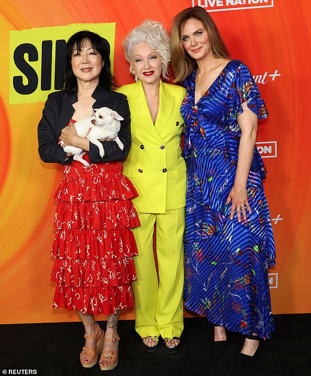 She also joined both Emily and Cyndi to take photos together on the red carpet before the screening began