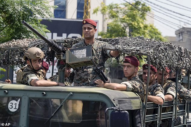 Lebanese special forces sit in their vehicle as they patrol a road leading to the US embassy in Auka