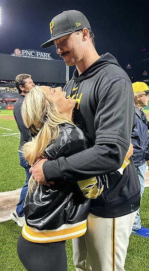 She stood in the stands to support him