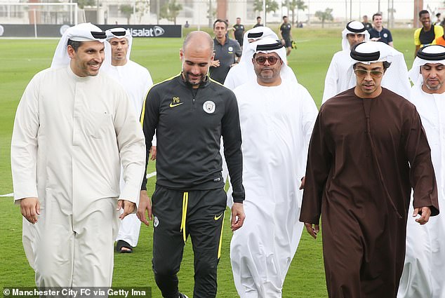 Man City owner Sheikh Mansour (right) next to Pep Guardiola (centre) and chairman Khaldoon Al Mubarrak (left), pictured in 2023