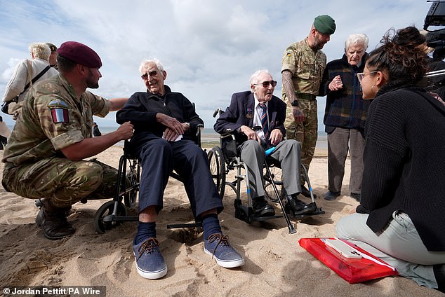 Corporal Aaron Stone, veterans John Life and Donald Jones were seen yesterday after returning to Sword Beach in Normandy, France, where they landed on D-Day