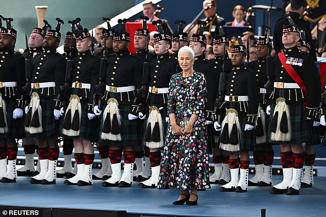 Helen Mirren is leading the proceedings today – and can be seen here on stage at the D-Day anniversary event