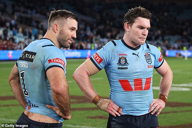 James Tedesco (left) and Liam Martin (right) spoke volumes with their facial expressions after the loss, which was all but sealed as soon as Suaalii dropped his shoulder