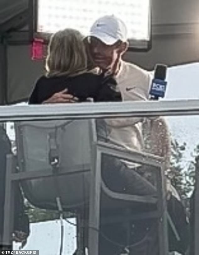 Rory McIlroy was pictured hugging CBS journalist Amanda Balionis after their TV interview