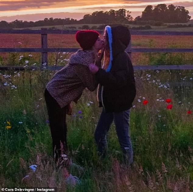 The series of photos showed them reminiscing and posing together - including a photo of them cuddling in a remote field at sunset