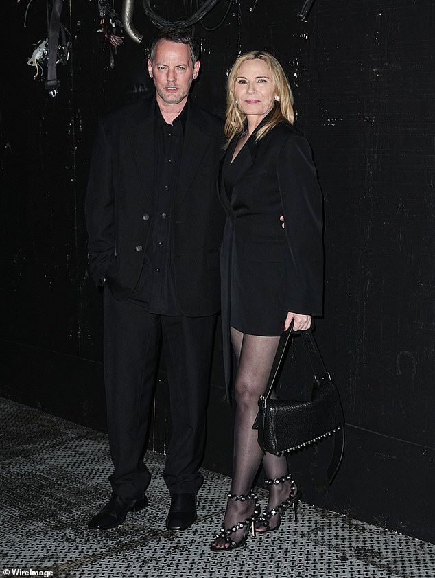 She was joined by boyfriend Russell Thomas, who looked handsome in a black suit and jacket