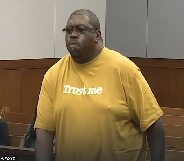 Simpson also cited Harris' very public remarks about the charges - which he said did not help his case. Harris, meanwhile, looked on silently - wearing a bright yellow t-shirt bearing the words 'trust me'