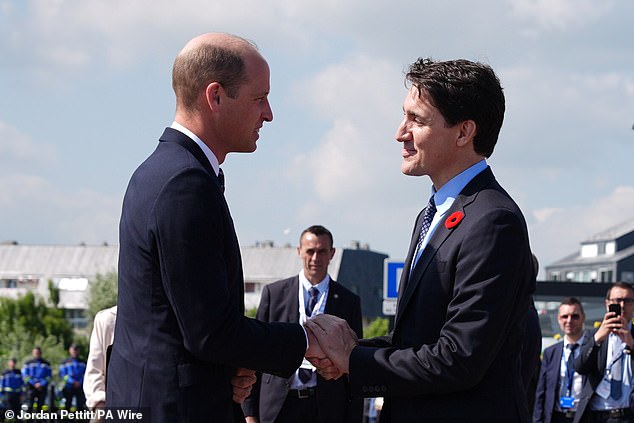 The Prince of Wales is greeted by Canadian Prime Minister Justin Trudeau ahead of the Government of Canada ceremony marking the 80th anniversary of D-Day on Juno Beach