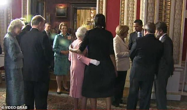 When the Queen met Michelle Obama in 2009 and the First Lady put her arm around her, the monarch responded