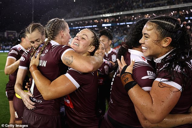 Ali Brigginshaw of the Maroons and Keilee Joseph of the Maroons embrace after winning game two of the Women's State of Origin series