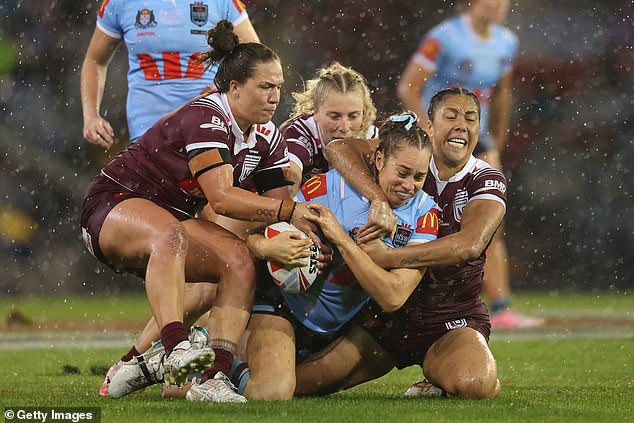 Kezie Apps of the Blues is tackled by Queensland Maroons ahead of the Maroons' incredible win