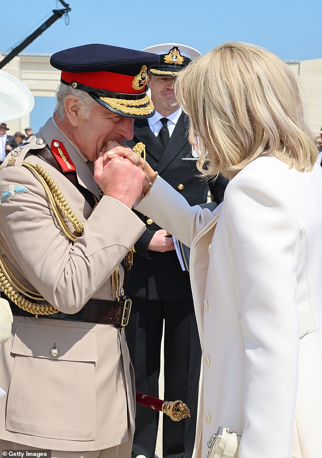 The monarch warmly greeted the French First Lady today in sunny Normandy, ahead of the event