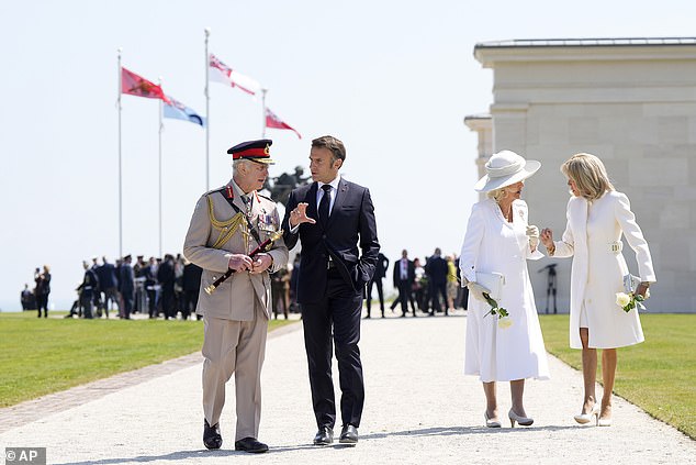 The King and Macron started to catch up as Camilla and Brigitte were animated as they talked and walked together