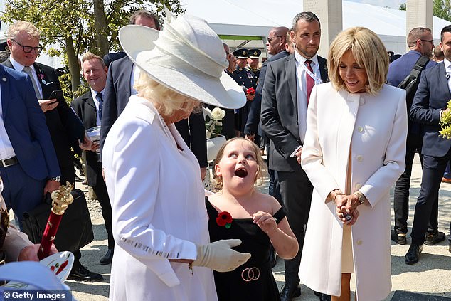 King Charles III, Queen Camilla and Brigitte Macron met young well-wishers during the commemoration event of the British Ministry of Defense and the Royal British Legion