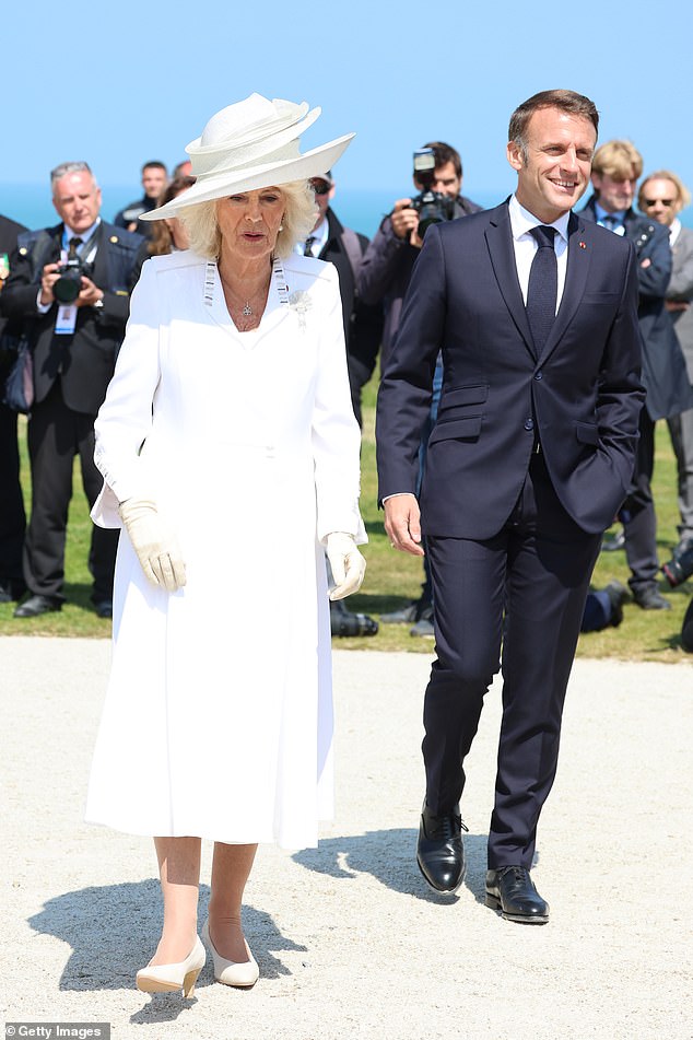 Queen Camilla is seen with President Macron as leaders gather in Normandy to commemorate D-Day