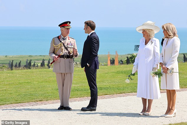 The group chatted with each other during the memorial event in Normandy