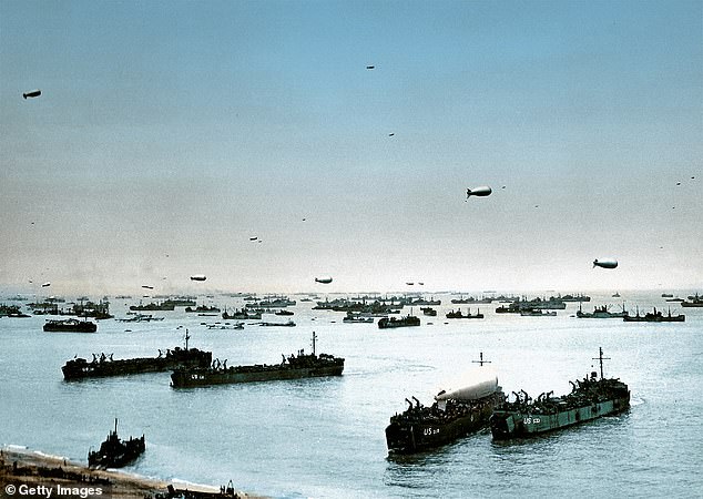 Allied ships, boats and barrage balloons at Omaha Beach after the successful D-Day invasion.  The bloody landing cost the lives of as many as 5,000 Allied soldiers