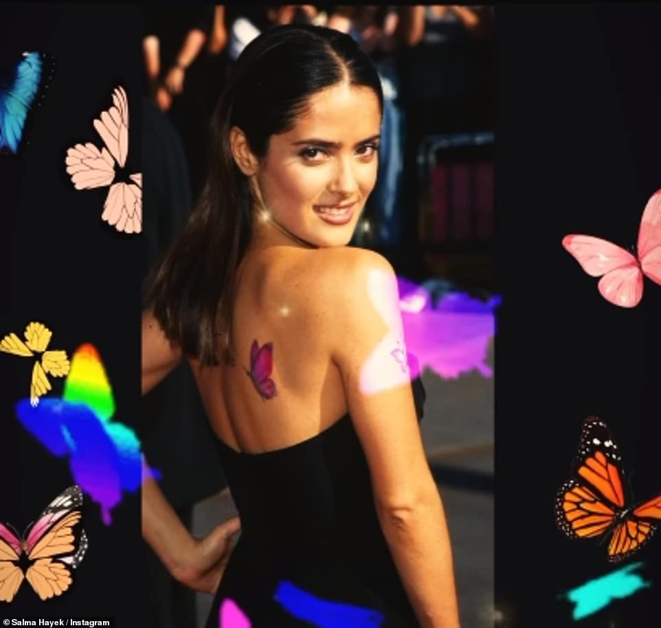 The Eternals star wore a black dress with fake butterfly tattoos as she hit the red carpet