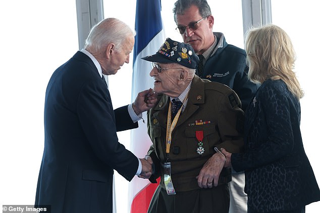 Biden enjoyed their company, handed out specially commissioned challenge coins and got to work with them