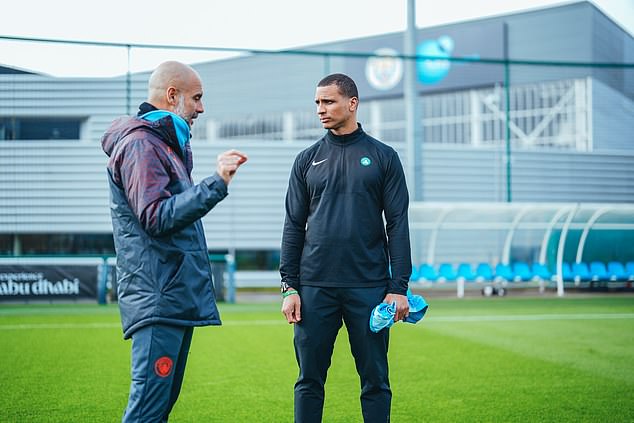 The Boston Celtics coach (right) met with Pep Guardiola (left) at City's training base in February